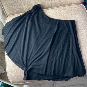 One shoulder “cape” style top.